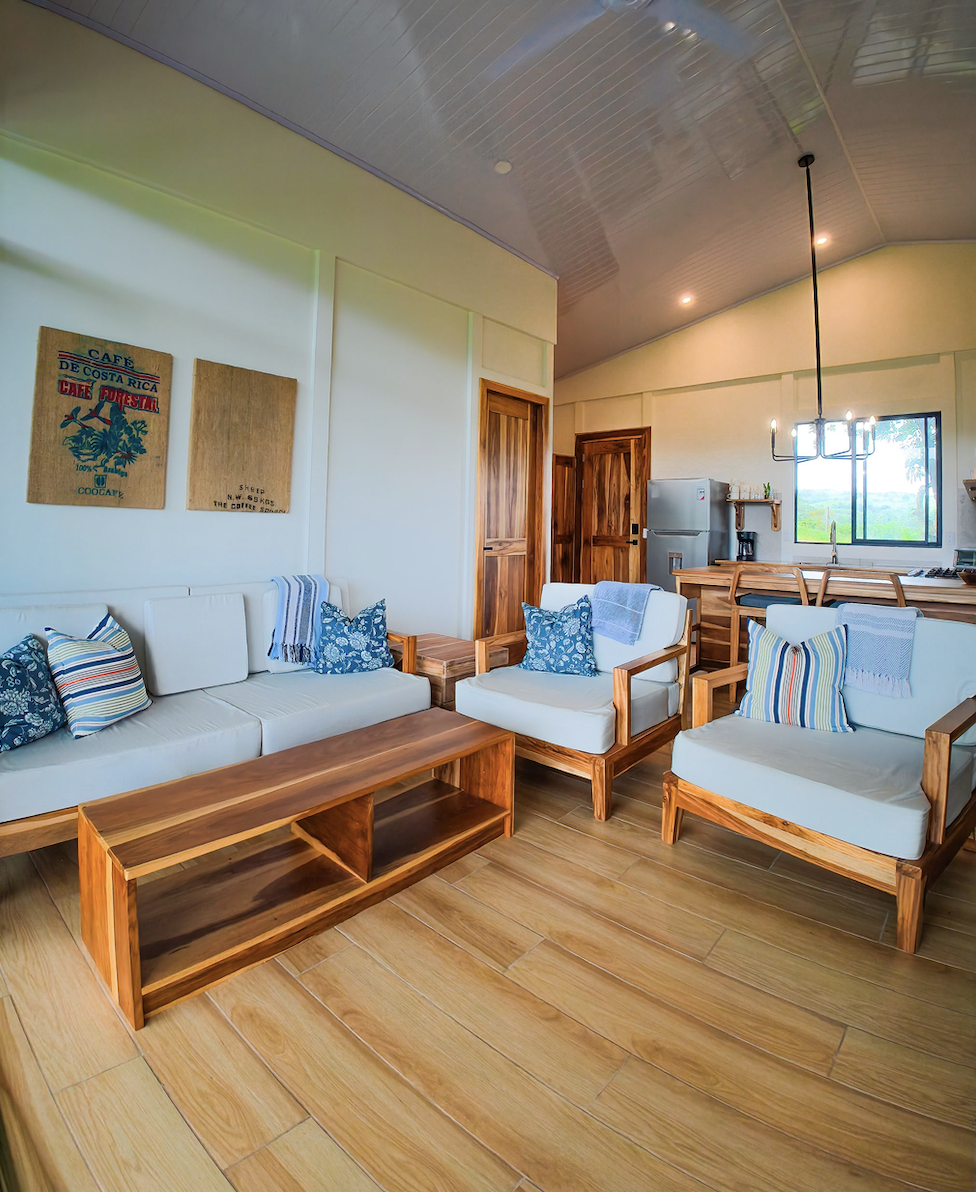 Open-plan living room with handmade wood seating
