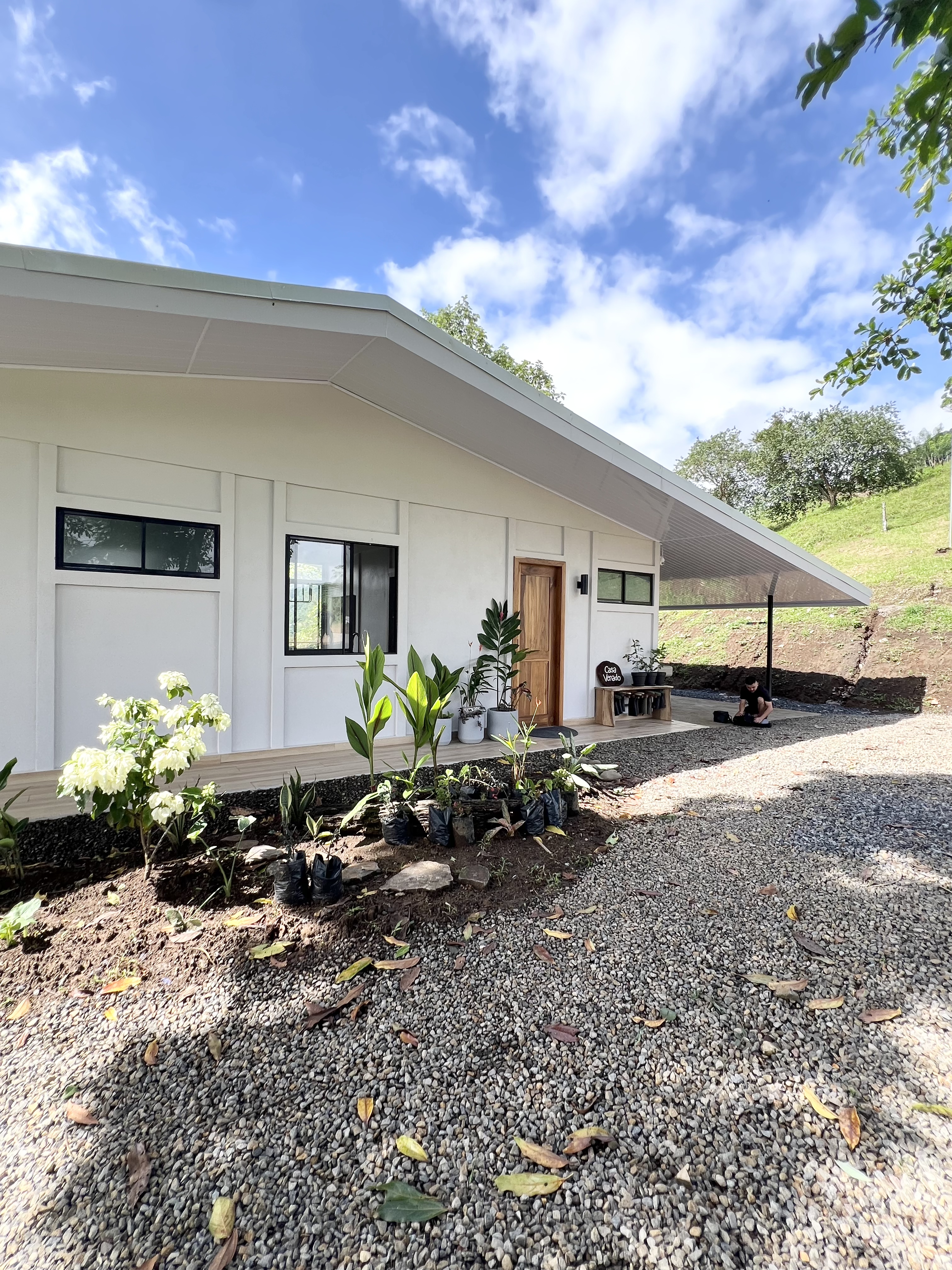 Casa Venado exterior — modern farmhouse with wraparound carport